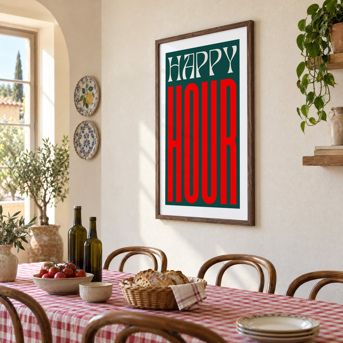 Happy Hour red and teal type print in a walnut frame above a gingham-covered trattoria table, seen at an angle