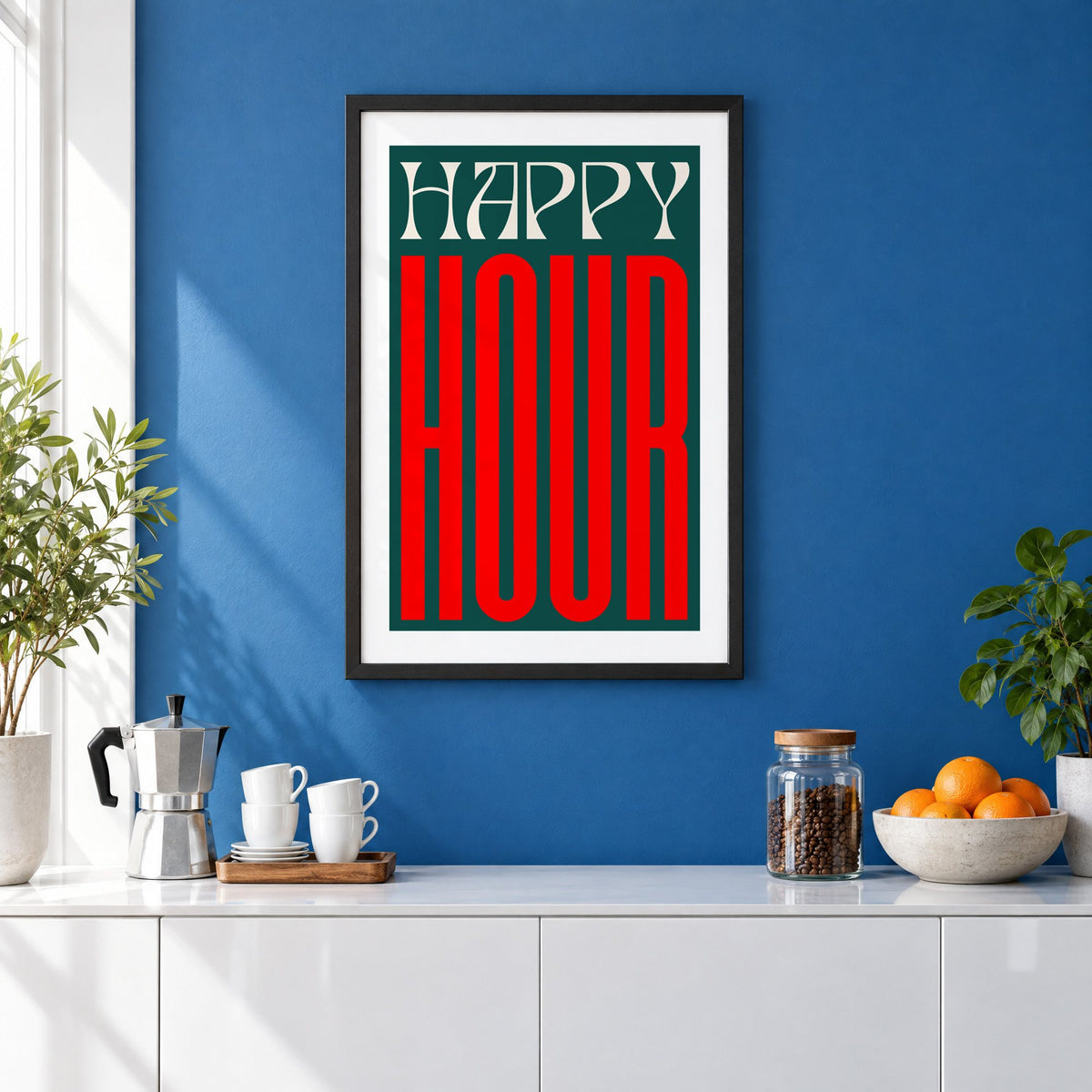 Happy Hour red and teal type print in a black frame on a cobalt blue wall above a coffee station