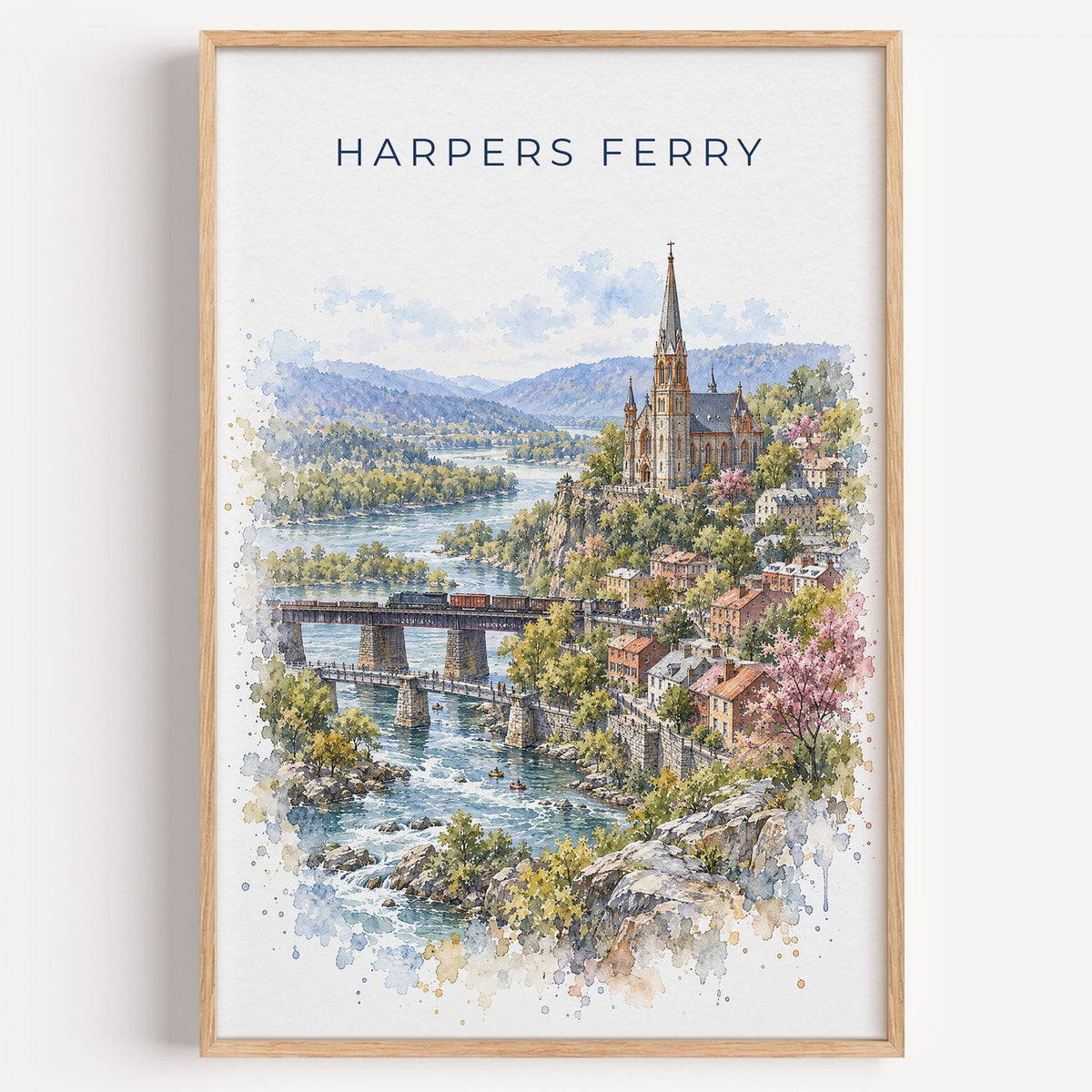 Harpers Ferry watercolor print in a light oak frame on a plain white wall