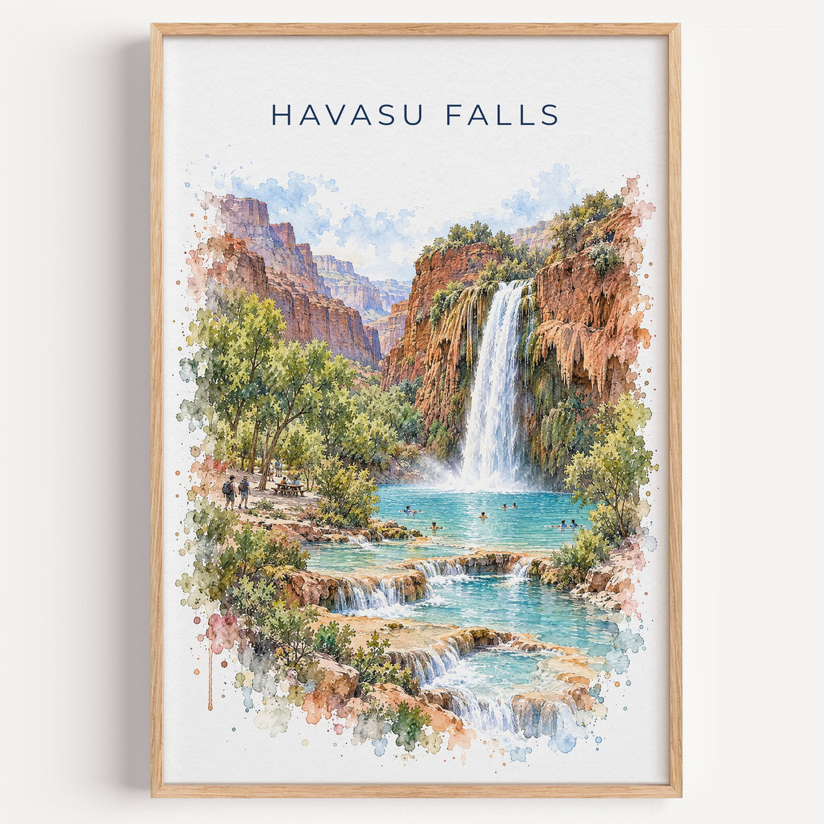 Havasu Falls watercolor print in a light oak frame on a plain white wall