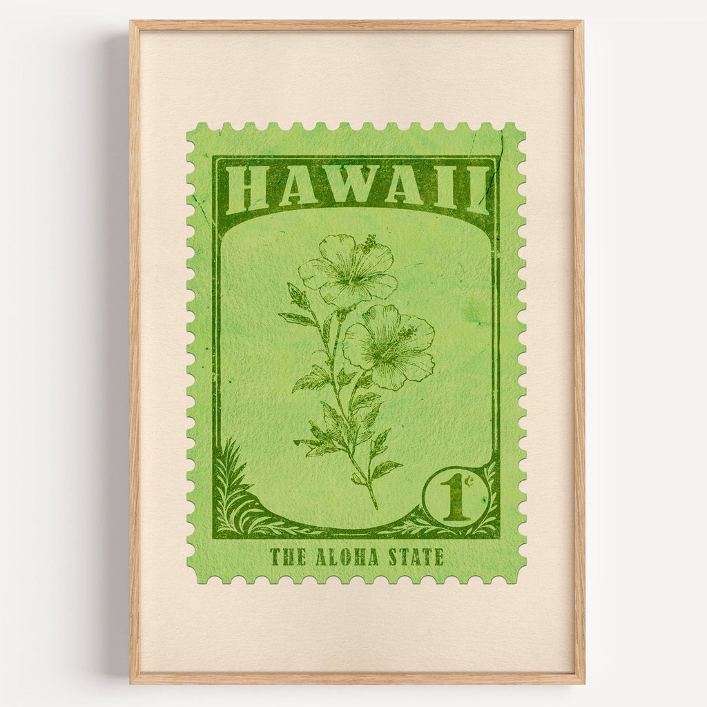 Hawaii state flower stamp print in forest green on lime, light oak frame on a plain white wall