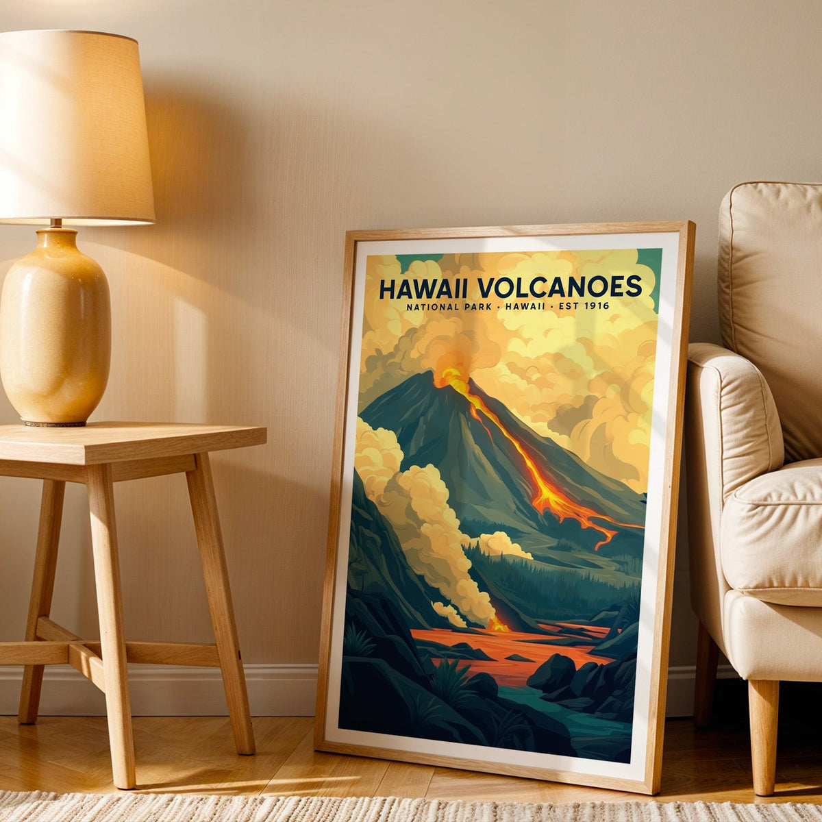 Hawaiʻi Volcanoes print in an oak frame beside a cream armchair and an amber lamp