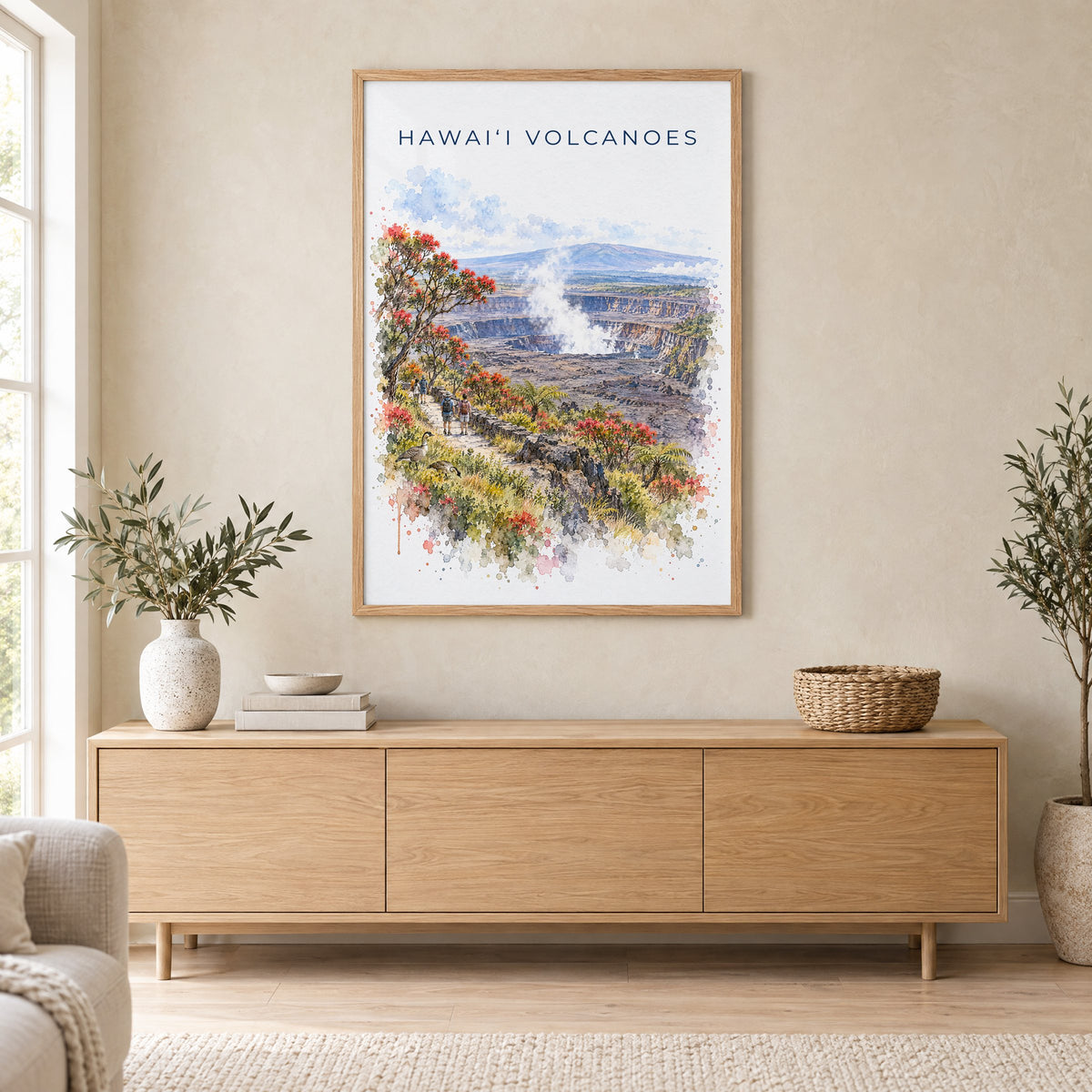 Hawaii Volcanoes National Park watercolor print in an oak frame above a light wood sideboard in a Scandinavian living room