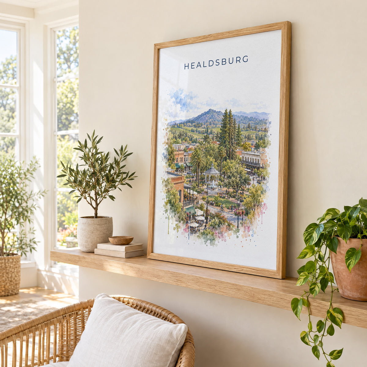 Healdsburg, California watercolor print in an oak frame on a picture ledge in a sunlit sunroom