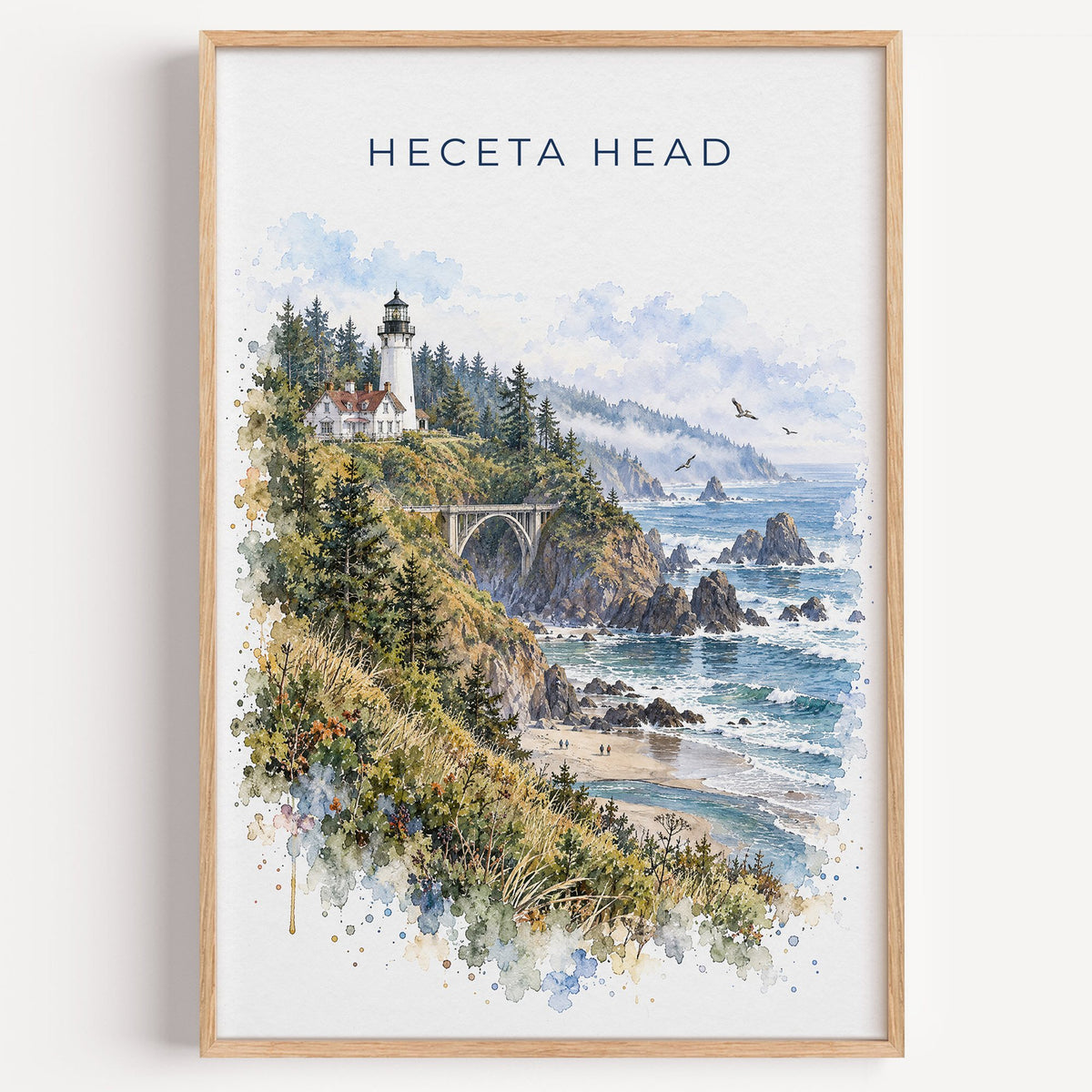 Heceta Head watercolor print in a light oak frame on a plain white wall