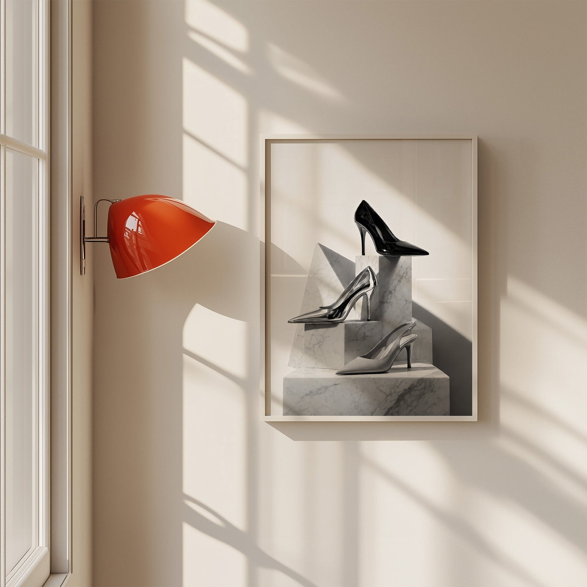 Three pairs of heels on marble pedestals print in a white frame on a sunlit wall beside a red sconce