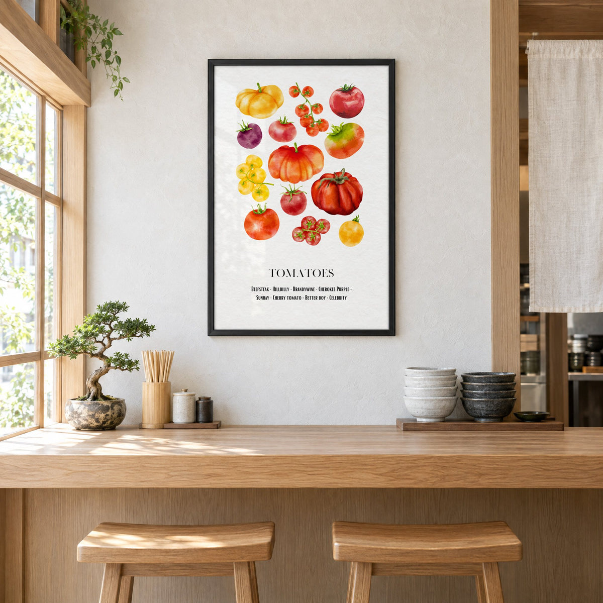 TOMATOES watercolor heirloom varieties chart print in a black frame above a light wood ramen counter with stools and stacked bowls