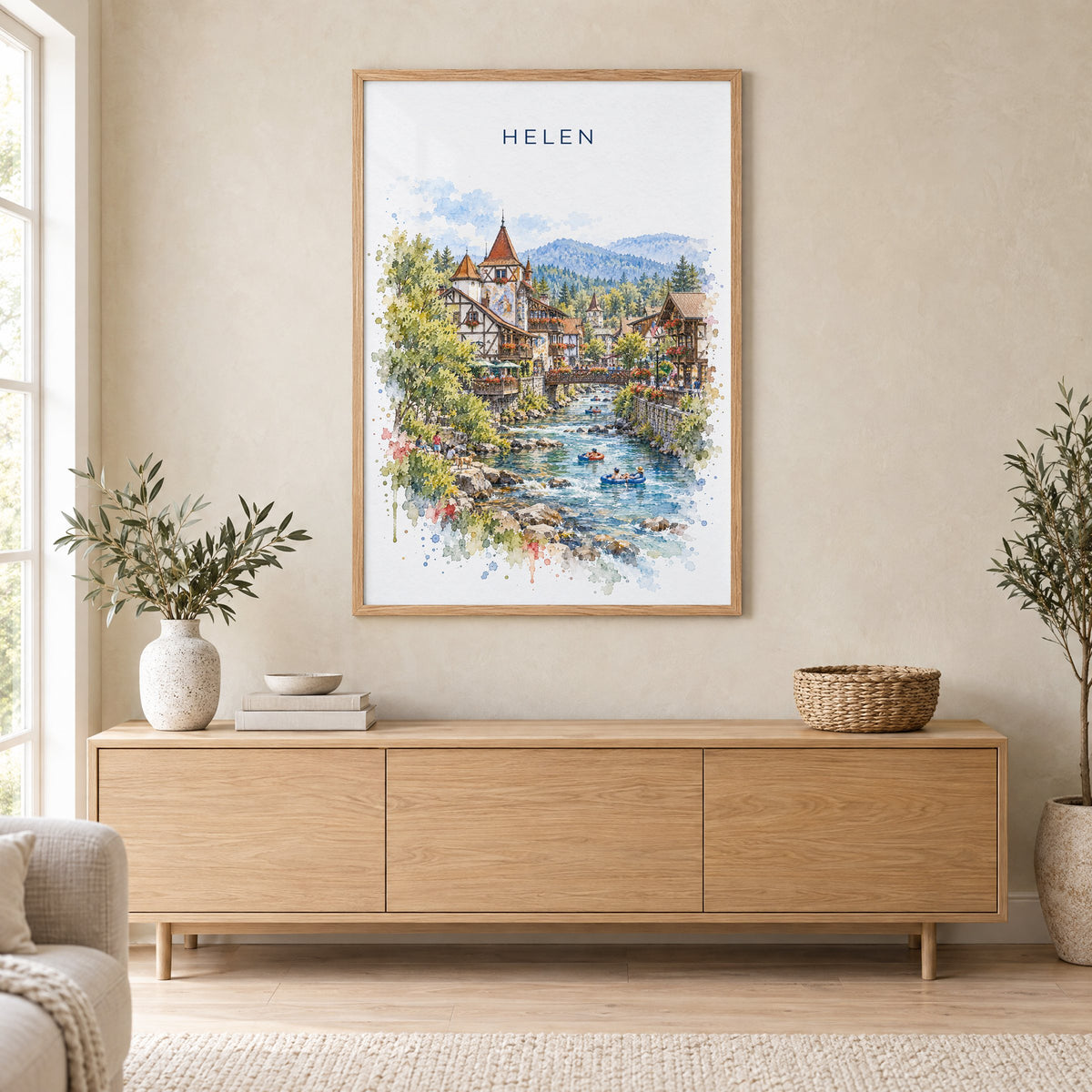 Helen, Georgia watercolor print in an oak frame above a light wood sideboard in a Scandinavian living room