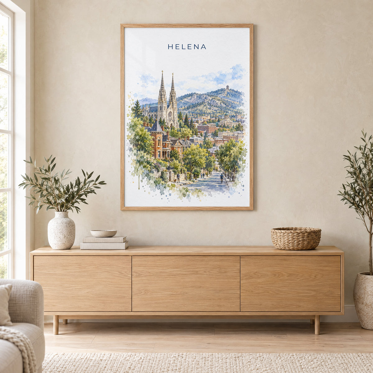 Helena, Montana watercolor print in an oak frame above a light wood sideboard in a Scandinavian living room