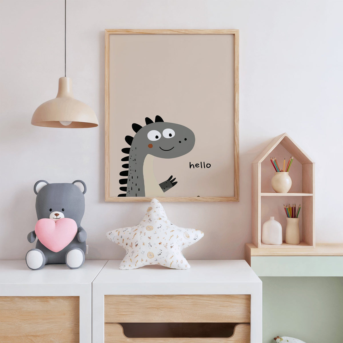 Hello peeking dinosaur nursery print in an oak frame above a white dresser with a star pillow and house shelf