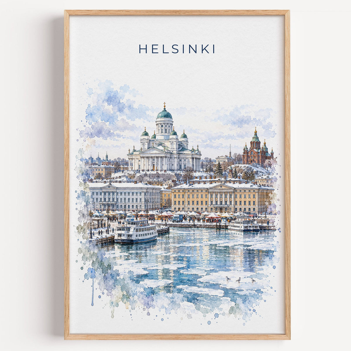 Helsinki watercolor print in a light oak frame on a plain white wall