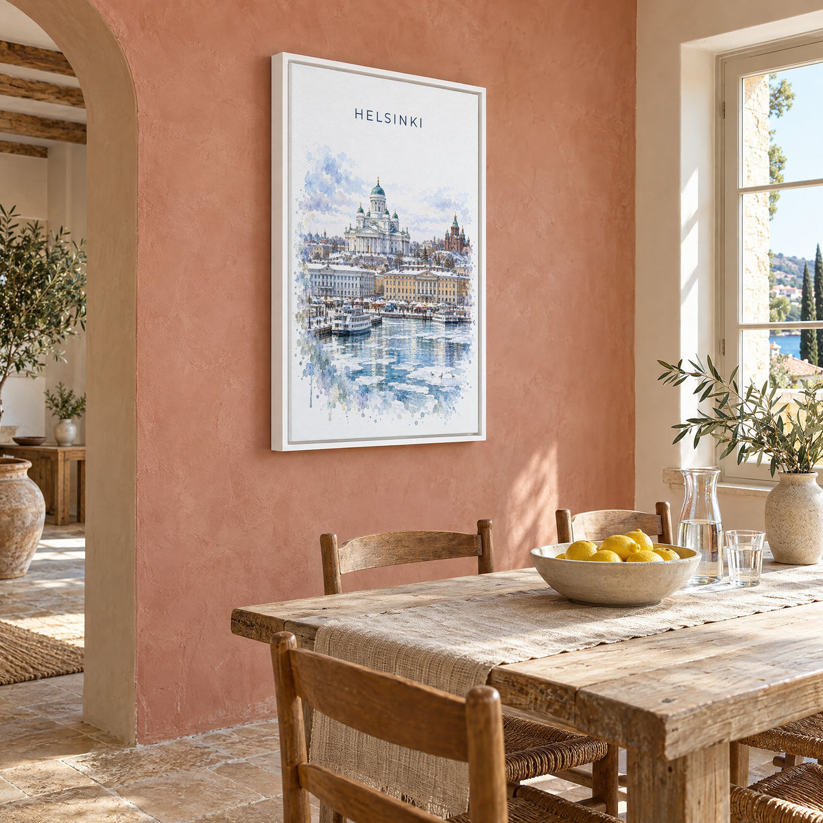 Helsinki watercolor print as a white floater canvas on a terracotta wall above a rustic dining table