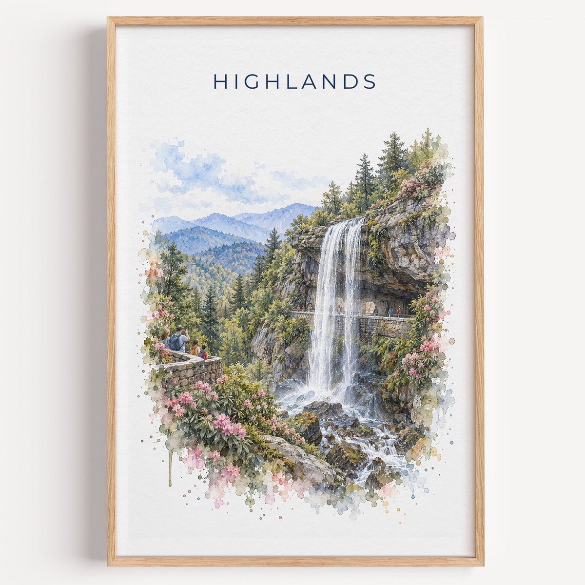 Highlands, North Carolina watercolor print in a light oak frame on a plain white wall