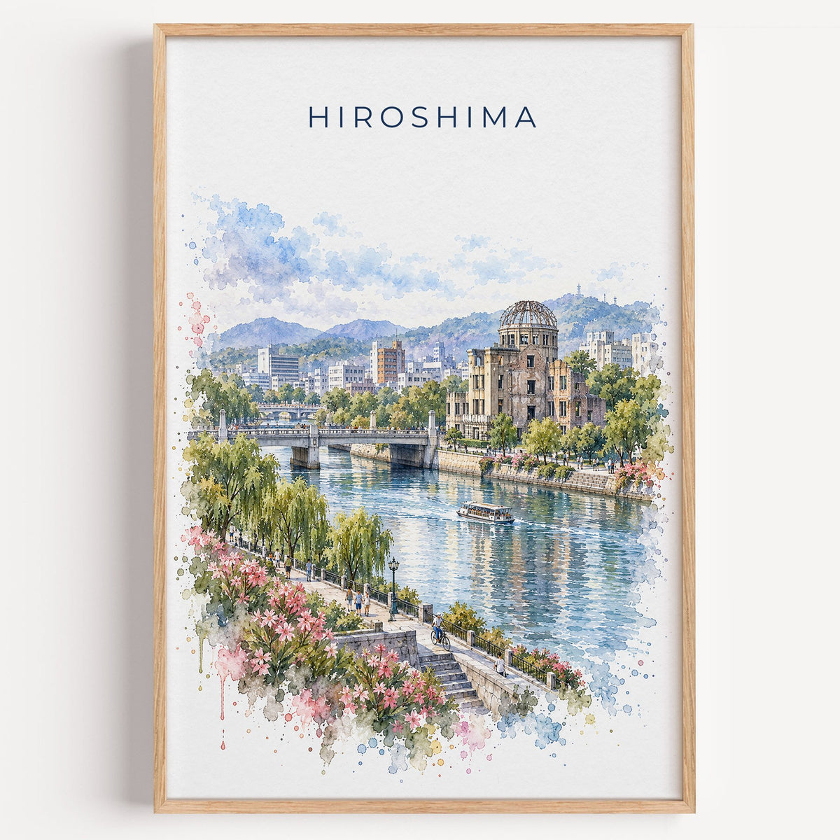 Hiroshima watercolor print in a light oak frame on a plain white wall