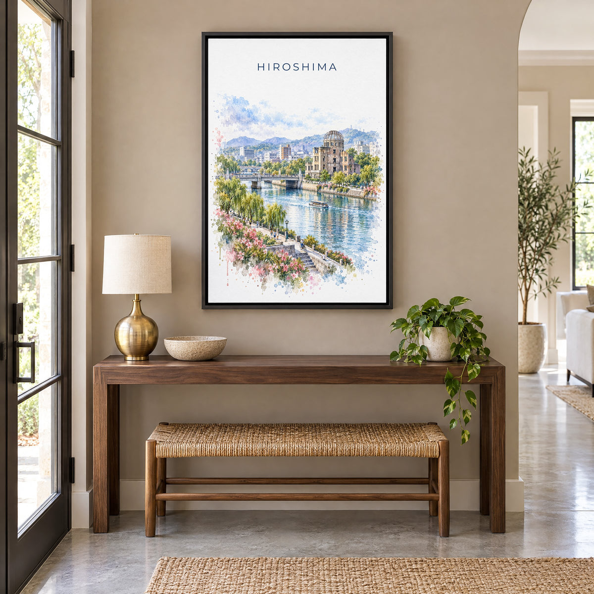 Hiroshima watercolor print as a black floater canvas above a walnut console and woven bench in an entryway