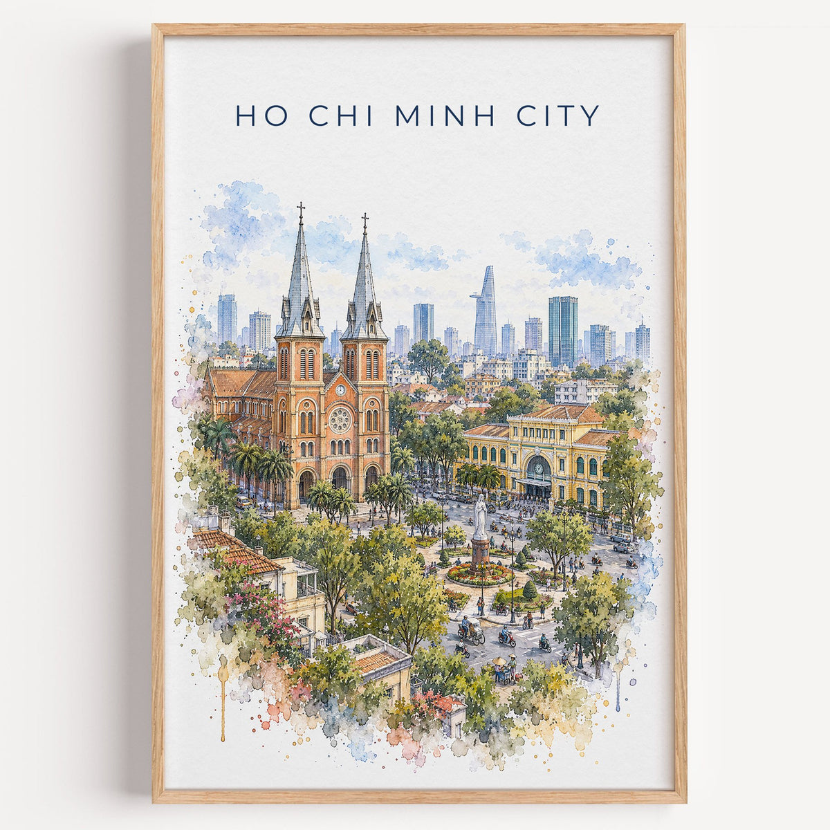 Ho Chi Minh City watercolor print in a light oak frame on a plain white wall