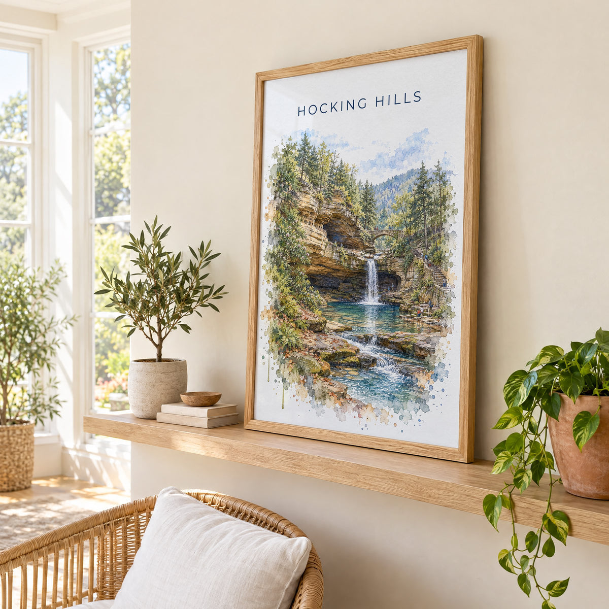 Hocking Hills watercolor print in an oak frame on a picture ledge in a sunlit sunroom
