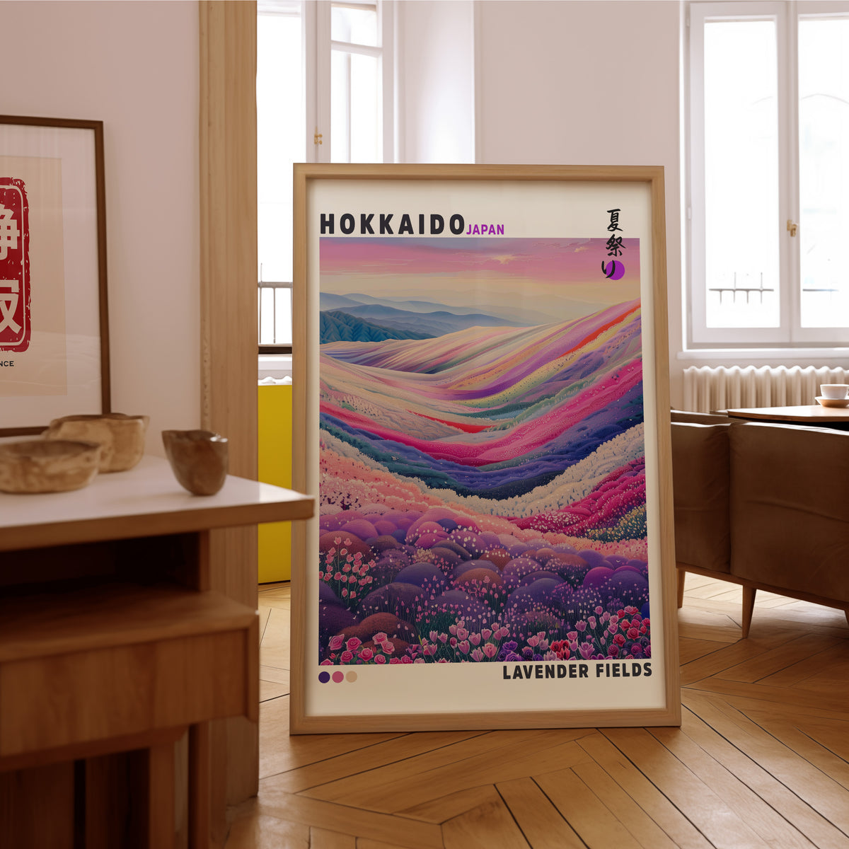Hokkaido lavender fields print in an oak frame on the parquet floor of a sunlit living room