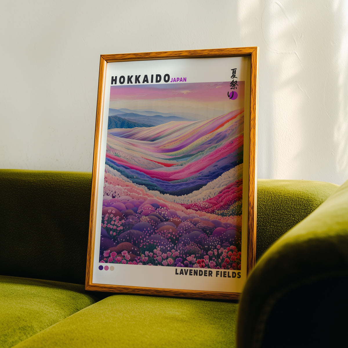 Hokkaido lavender fields print in an oak frame propped on a green velvet sofa