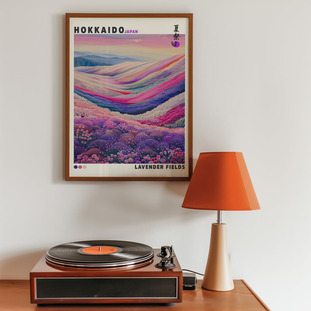 Hokkaido lavender fields print in a walnut frame above a sideboard with a record player