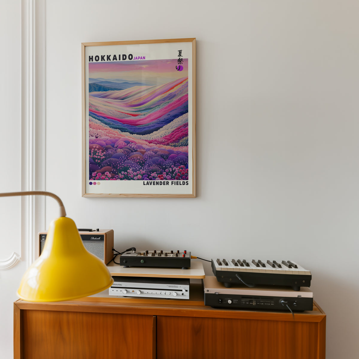 Hokkaido lavender fields print in an oak frame above a teak sideboard with vintage hi-fi