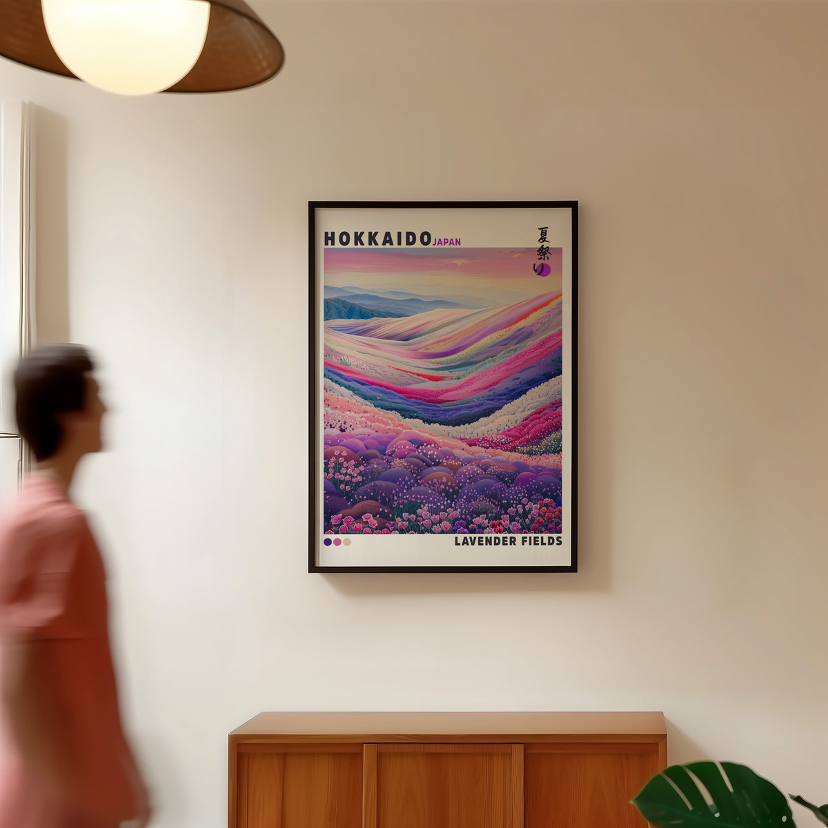 Hokkaido lavender fields print in a black frame in a hallway under a rattan pendant