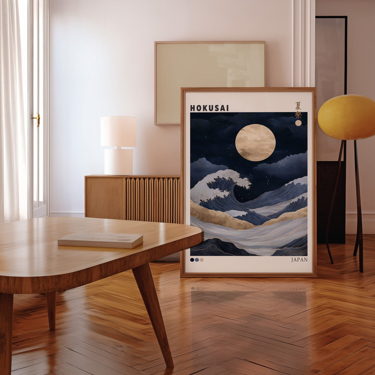 Hokusai night wave gold moon print in a walnut frame leaning in a mid-century living room