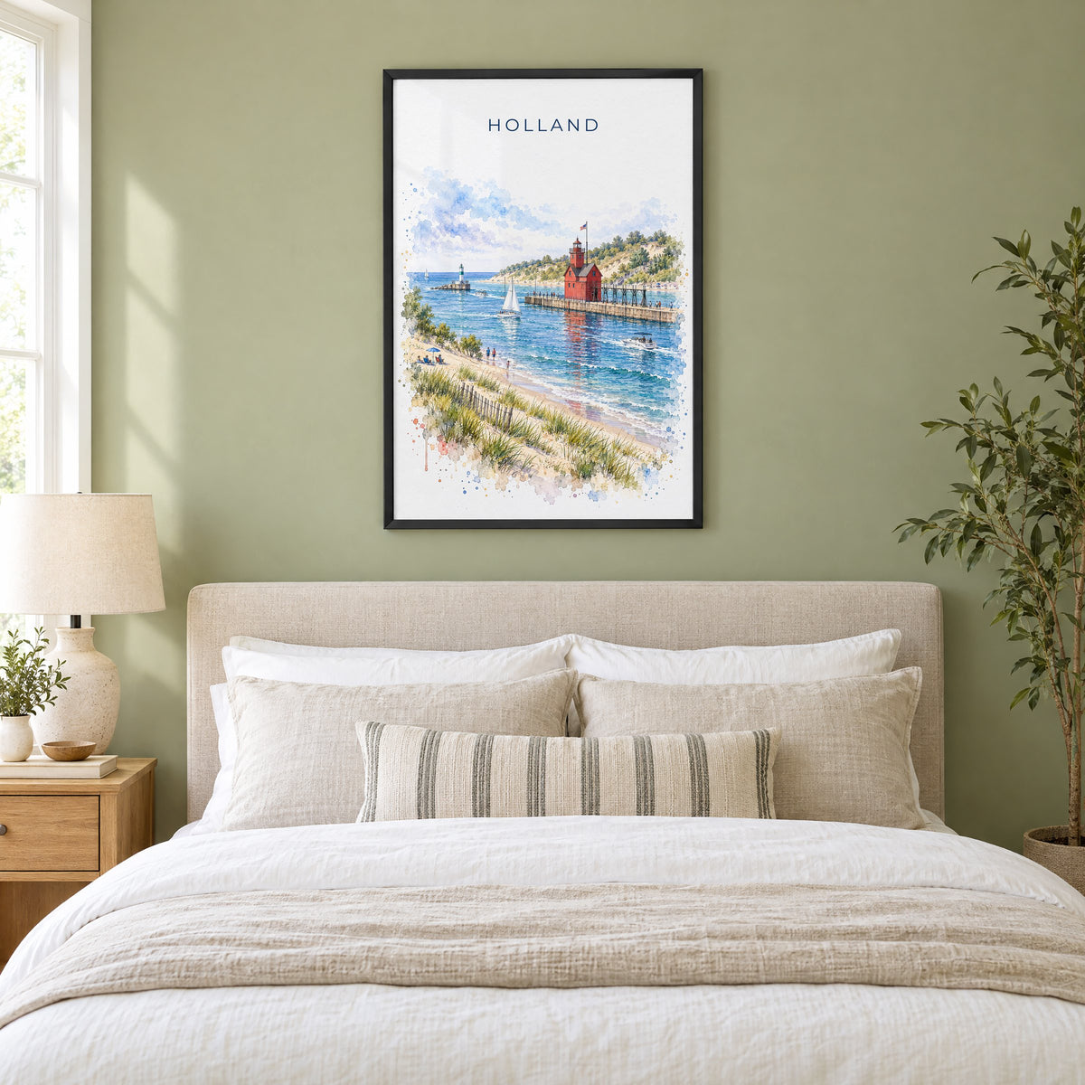 Holland, Michigan watercolor print in a black frame above an upholstered headboard in a sage green bedroom