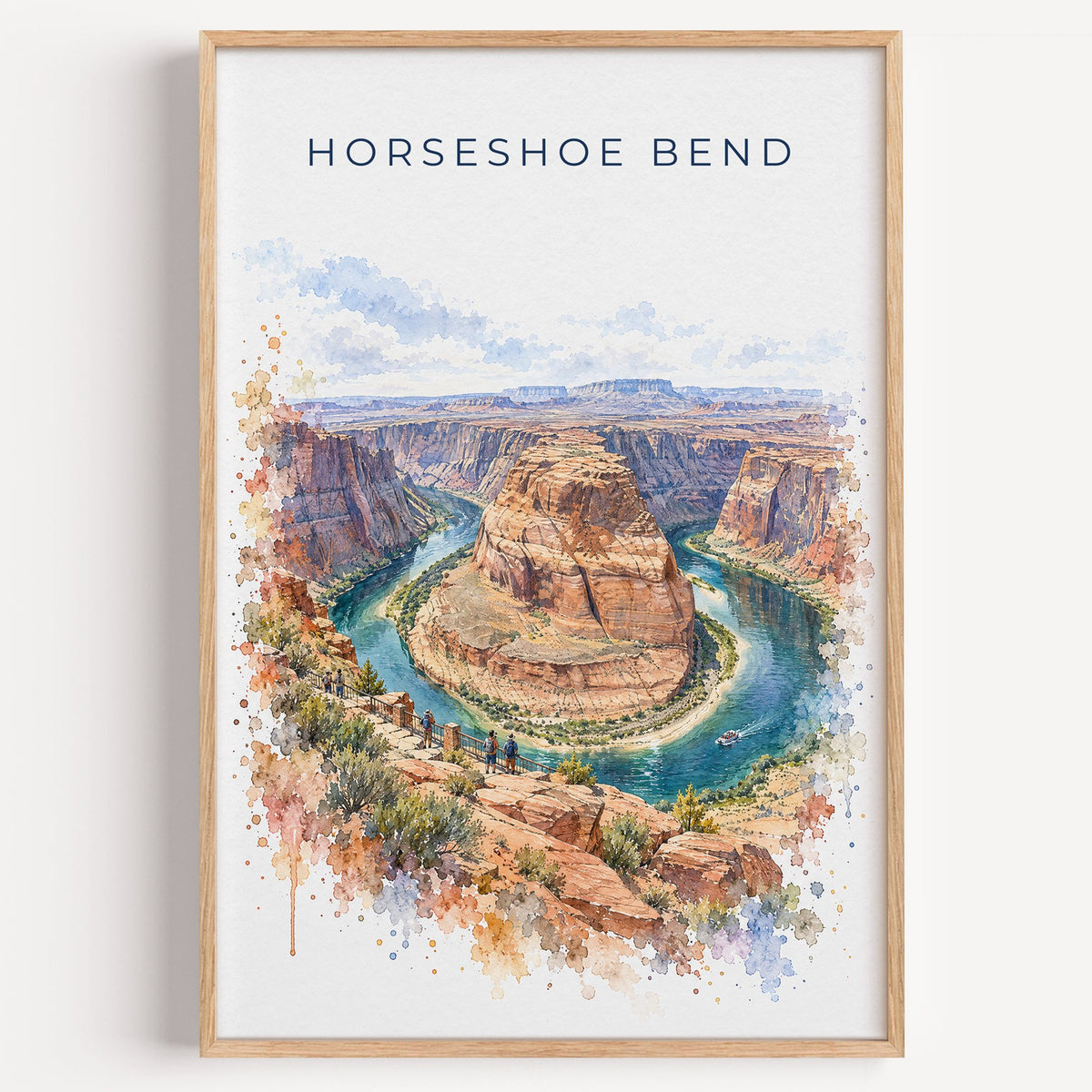 Horseshoe Bend watercolor print in a light oak frame on a plain white wall