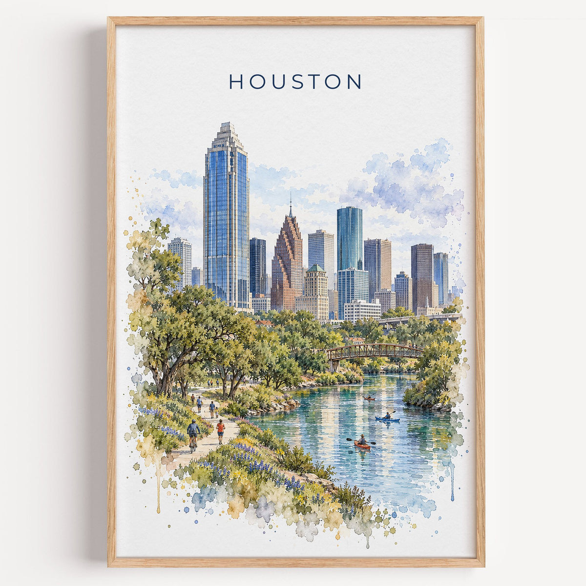 Houston watercolor print in a light oak frame on a plain white wall