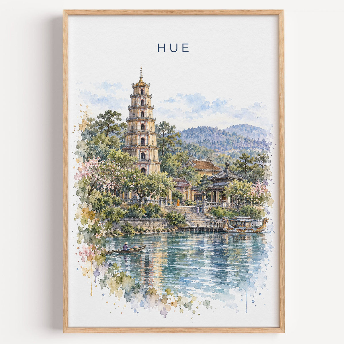 Hue, Vietnam watercolor print in a light oak frame on a plain white wall