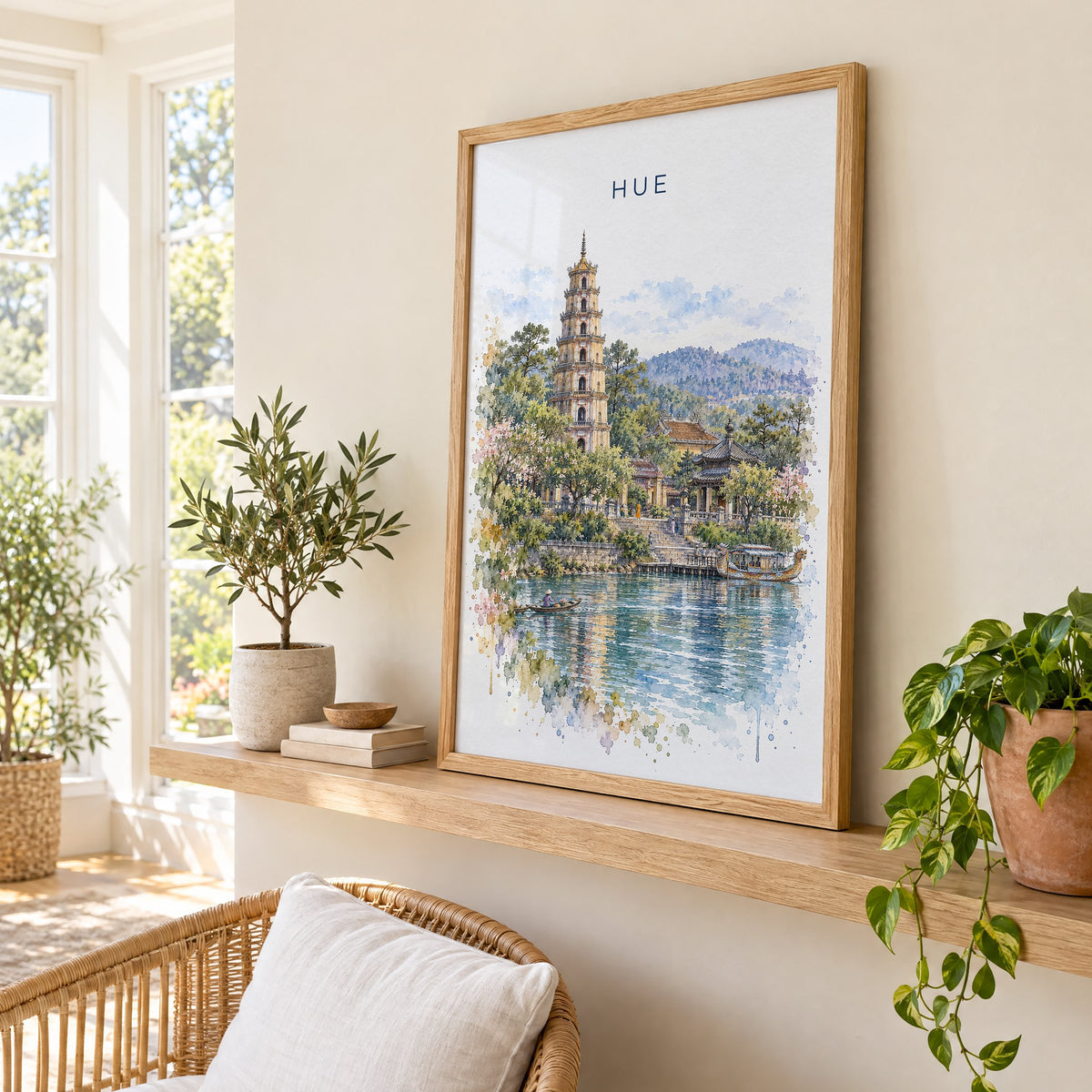 Hue, Vietnam watercolor print in an oak frame on a picture ledge in a sunlit sunroom