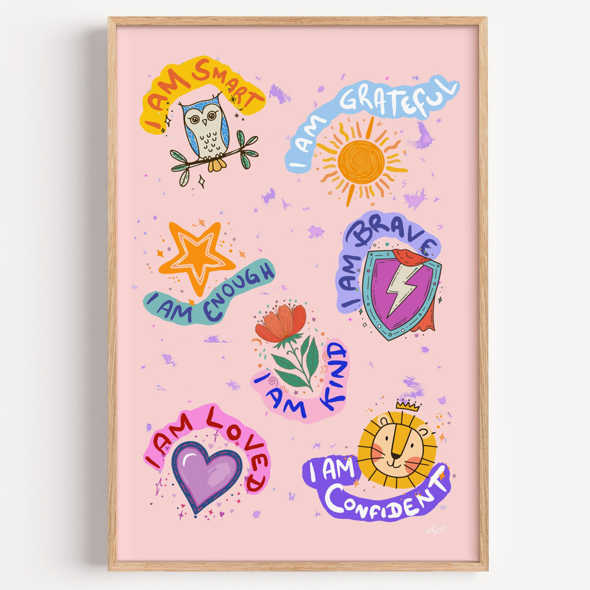 I am affirmations sticker nursery print in a light oak frame on a plain white wall