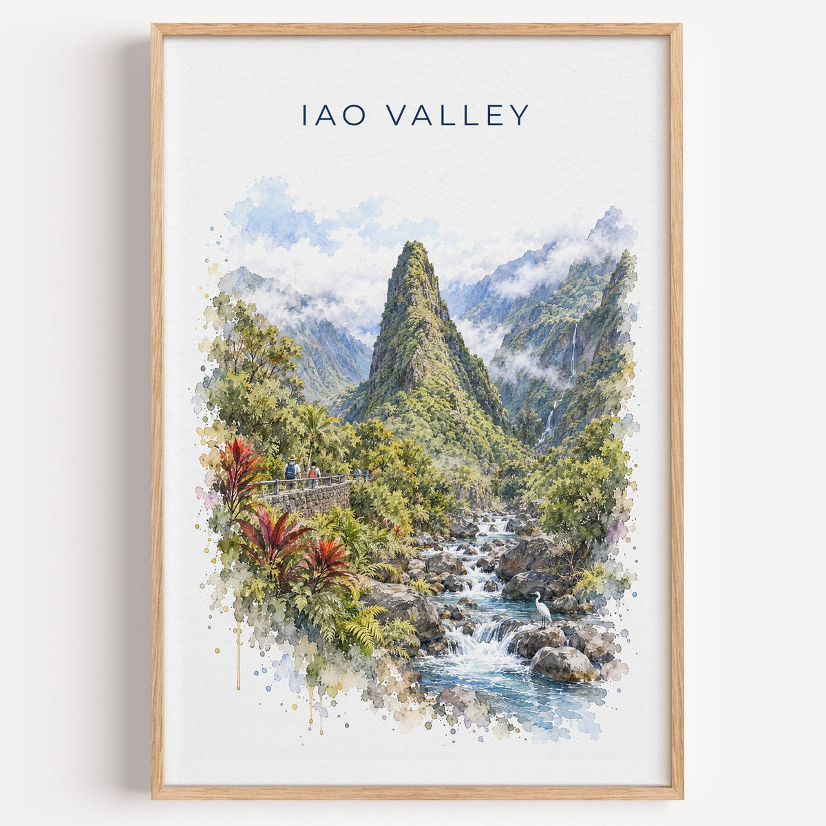 Iao Valley watercolor print in a light oak frame on a plain white wall