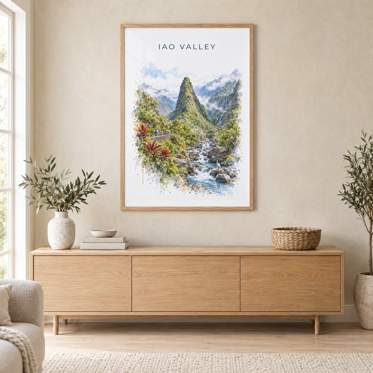 Iao Valley watercolor print in an oak frame above a light wood sideboard in a Scandinavian living room