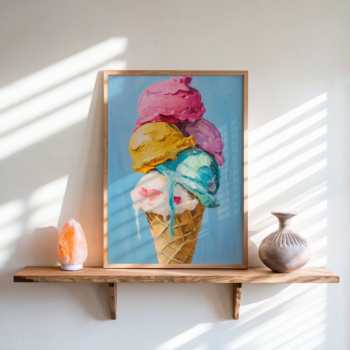 Ice cream cone print in an oak frame on a live-edge shelf beside a salt lamp