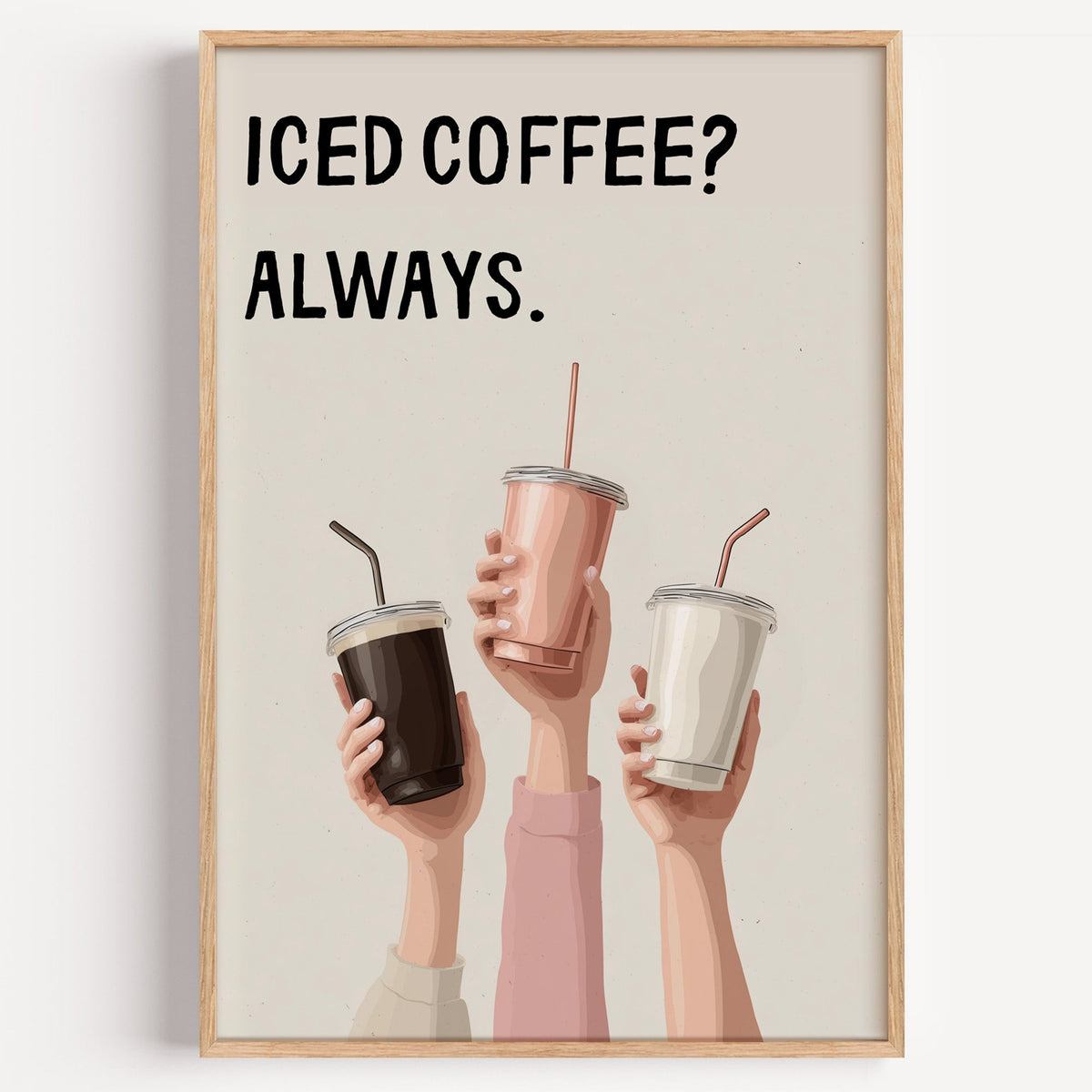 Iced Coffee Always three cups print in a light oak frame on a plain white wall