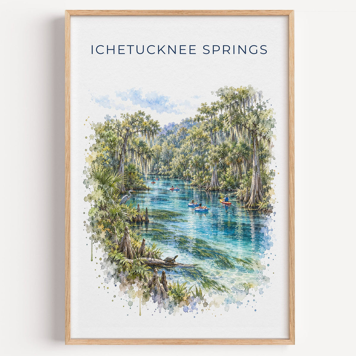 Ichetucknee Springs State Park watercolor print in a light oak frame on a plain white wall