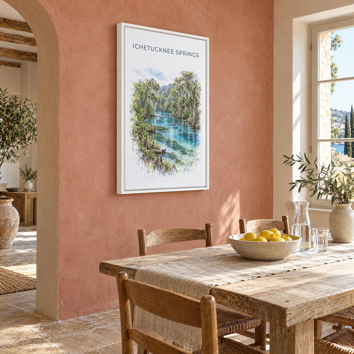 Ichetucknee Springs State Park watercolor print as a white floater canvas on a terracotta wall above a rustic dining table
