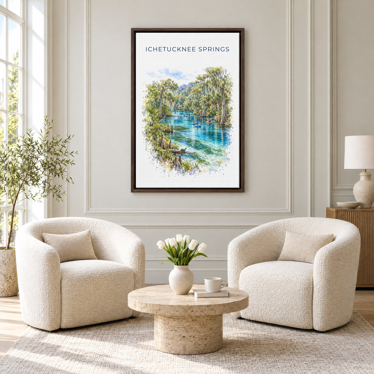 Ichetucknee Springs State Park watercolor print as an espresso floater canvas above two boucle armchairs in a hotel lounge