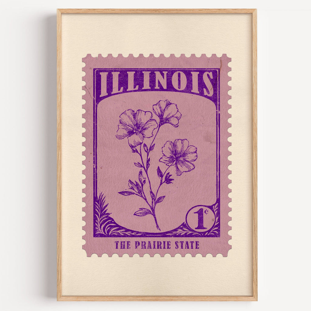Illinois state flower stamp print in violet on mauve, light oak frame on a plain white wall