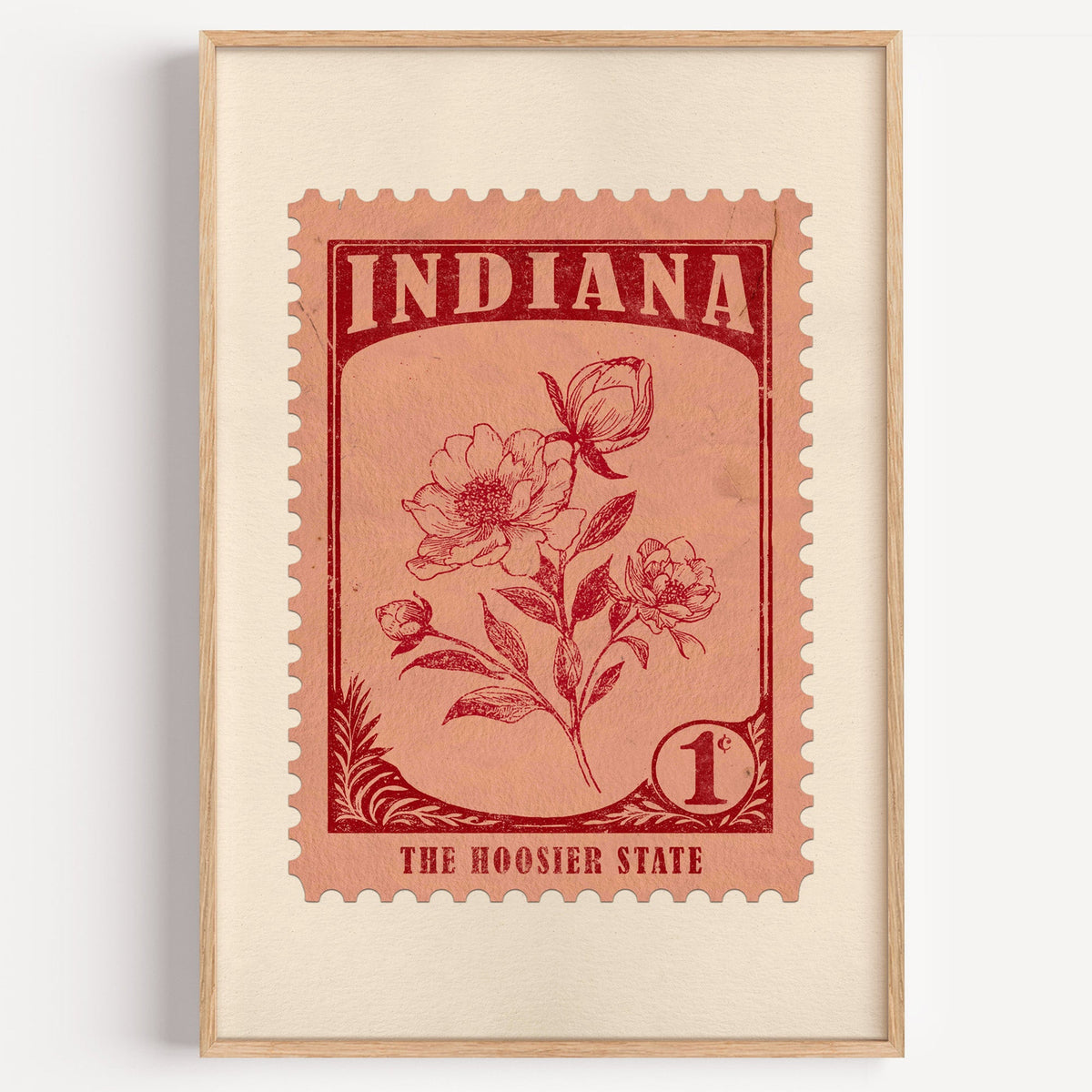 Indiana state flower stamp print in deep crimson on salmon, light oak frame on a plain white wall