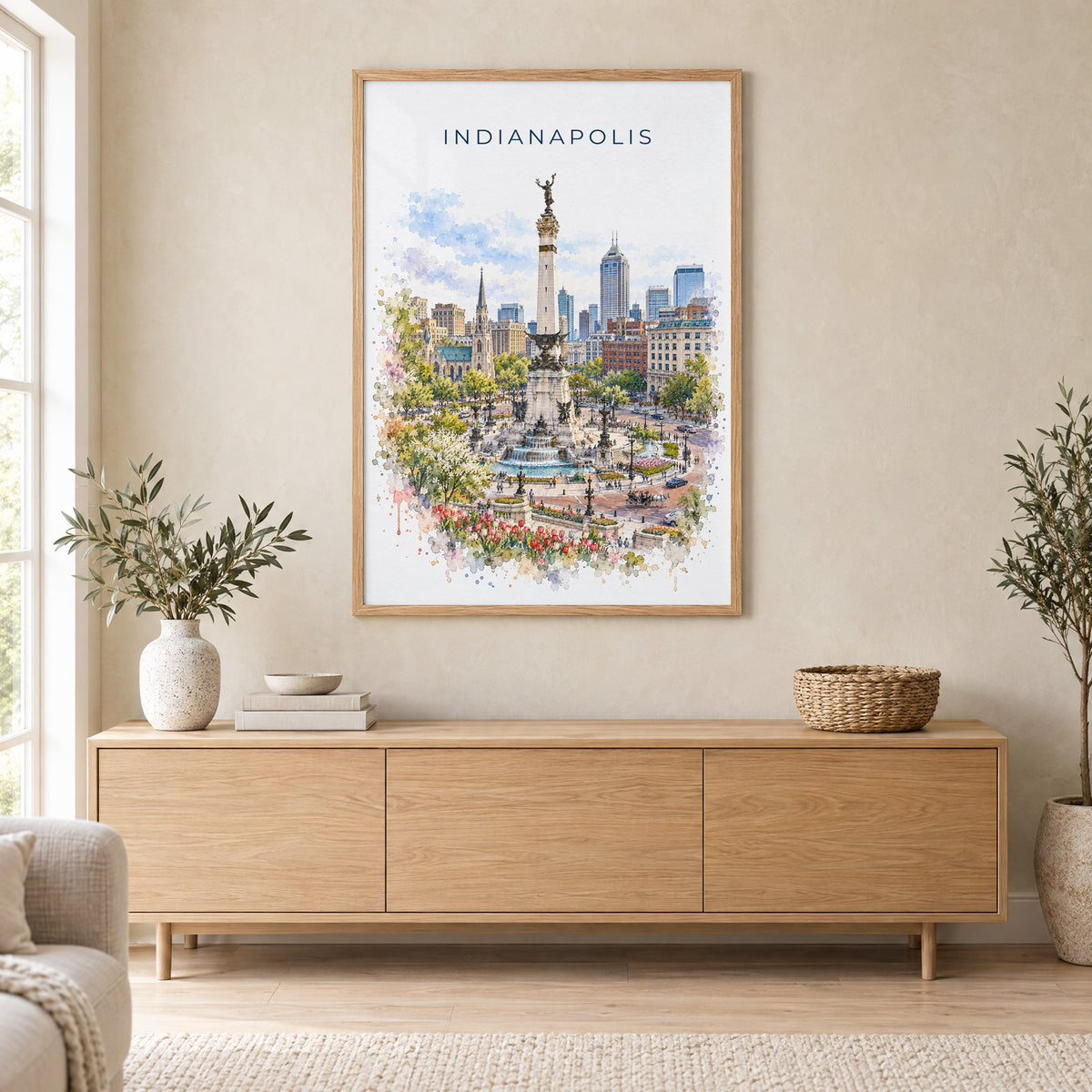 Indianapolis watercolor print in an oak frame above a light wood sideboard in a Scandinavian living room