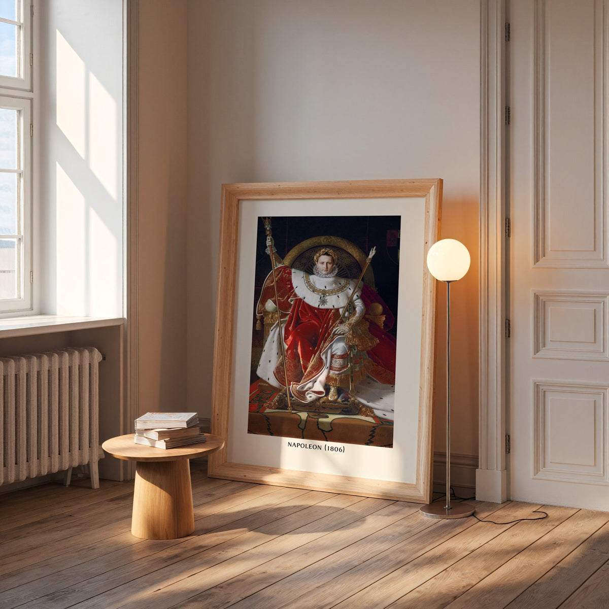 Ingres Napoleon print in a wide pine frame leaning by a sunlit window