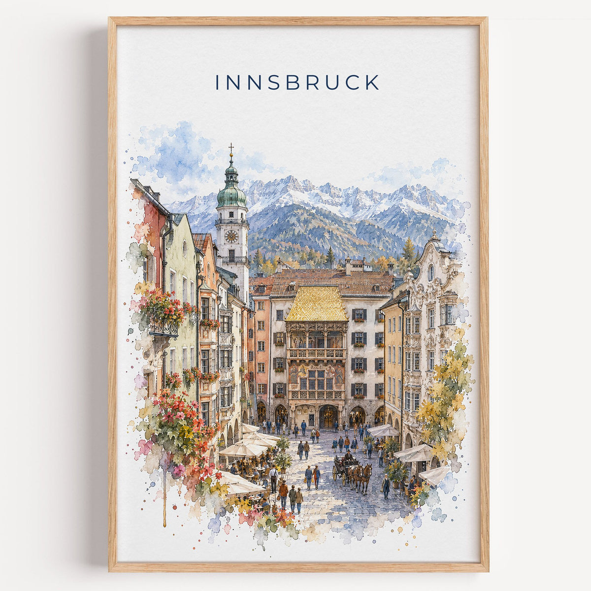 Innsbruck watercolor print in a light oak frame on a plain white wall