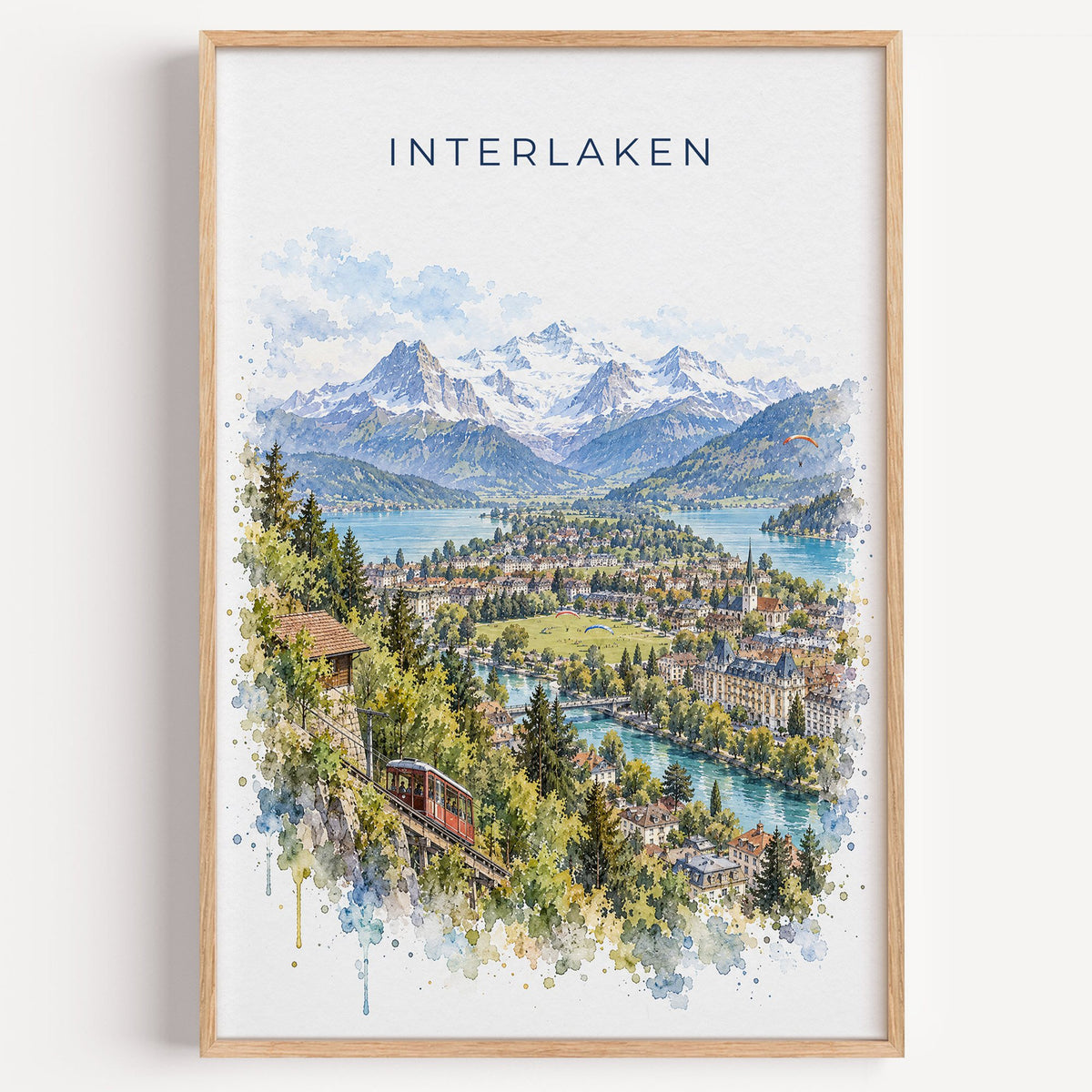 Interlaken watercolor print in a light oak frame on a plain white wall