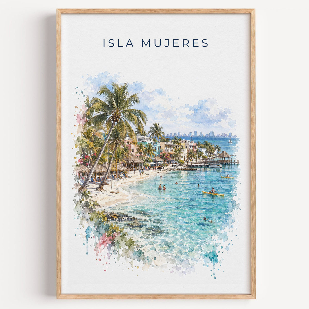 Isla Mujeres watercolor print in a light oak frame on a plain white wall
