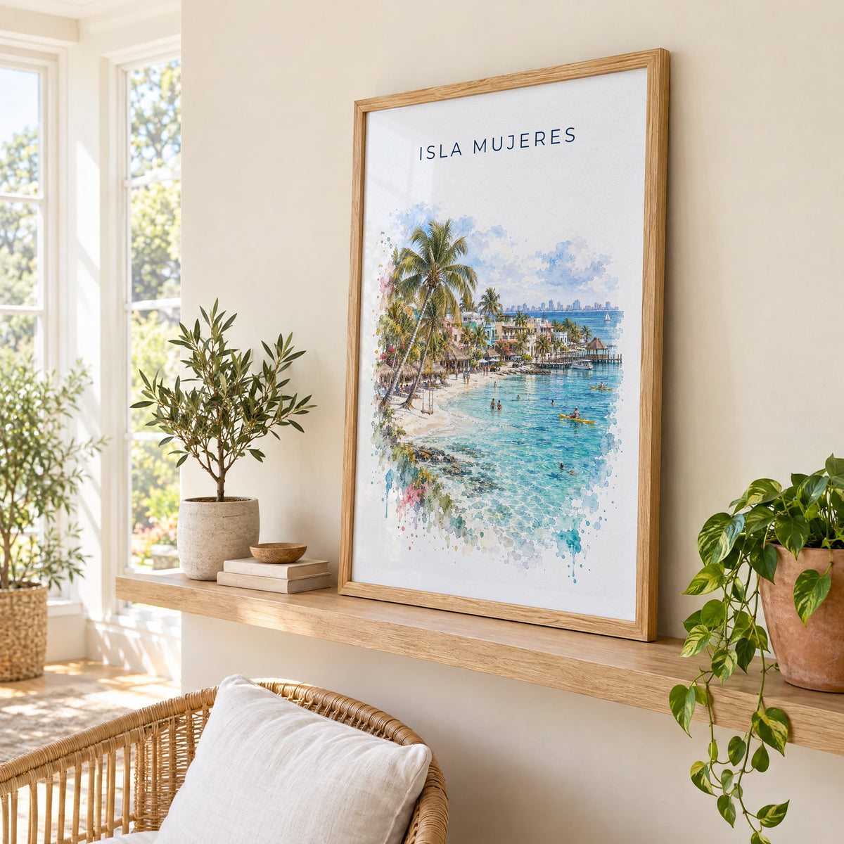 Isla Mujeres watercolor print in an oak frame on a picture ledge in a sunlit sunroom