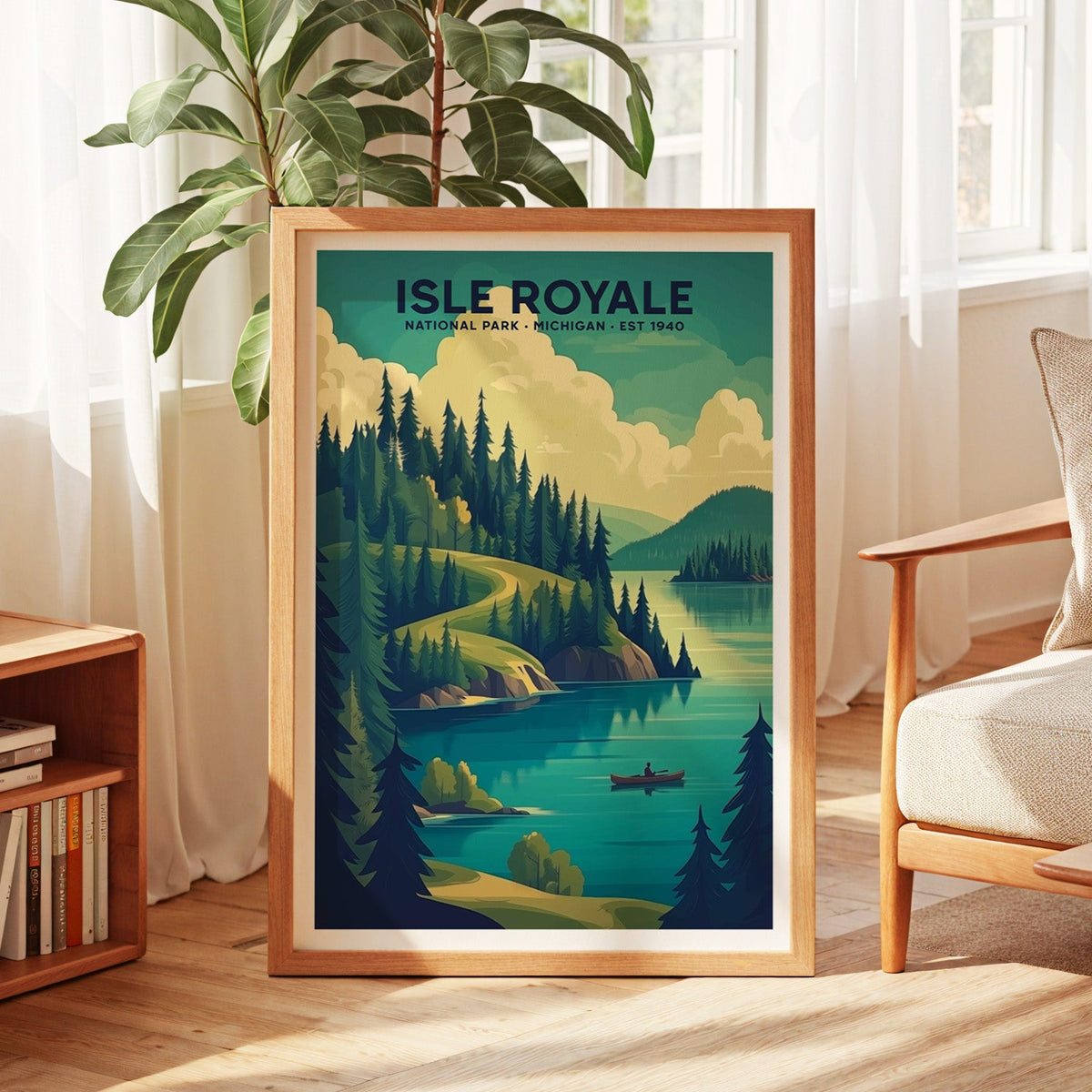 Isle Royale National Park print in an oak frame by a sunlit window with sheer curtains and a fig plant