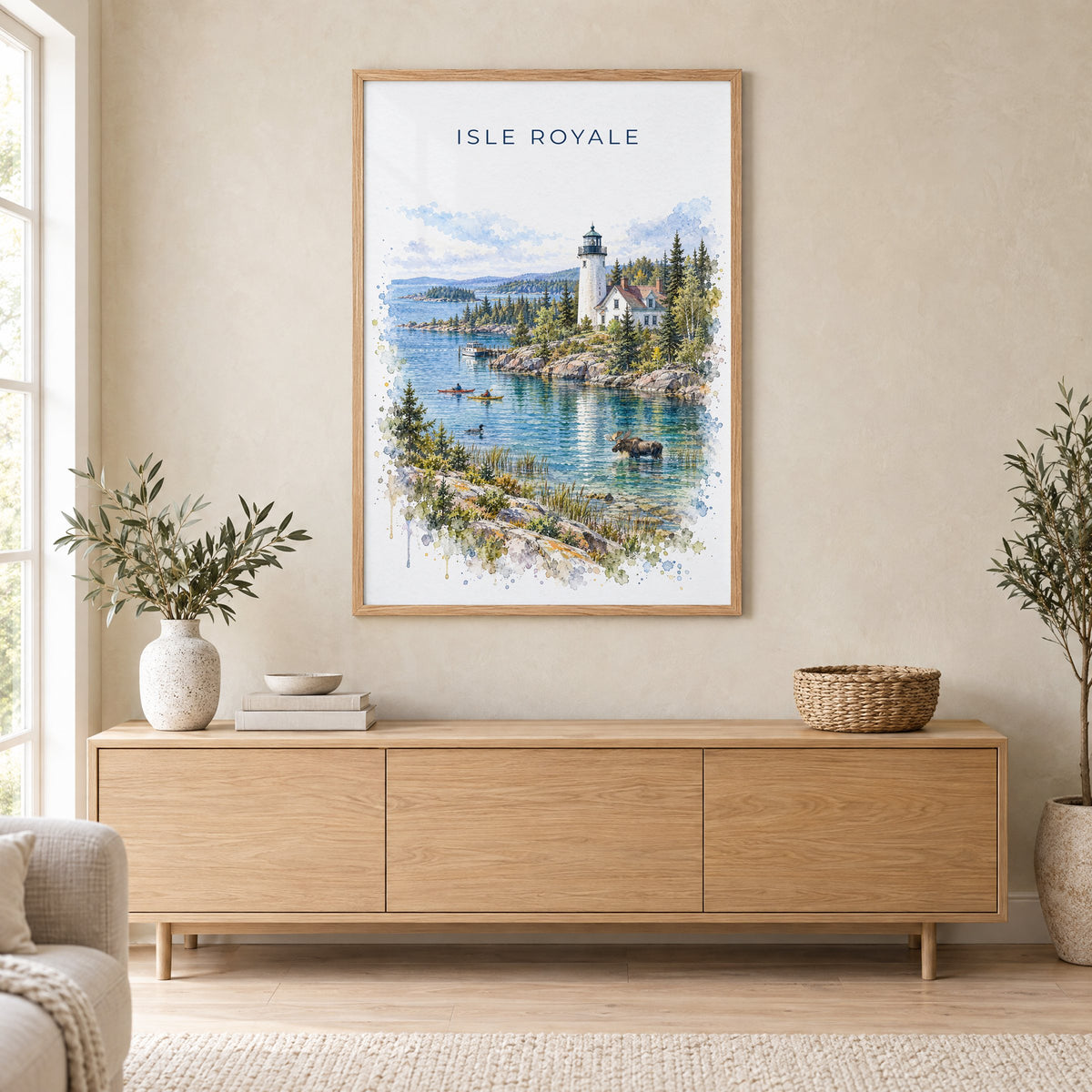 Isle Royale National Park watercolor print in an oak frame above a light wood sideboard in a Scandinavian living room